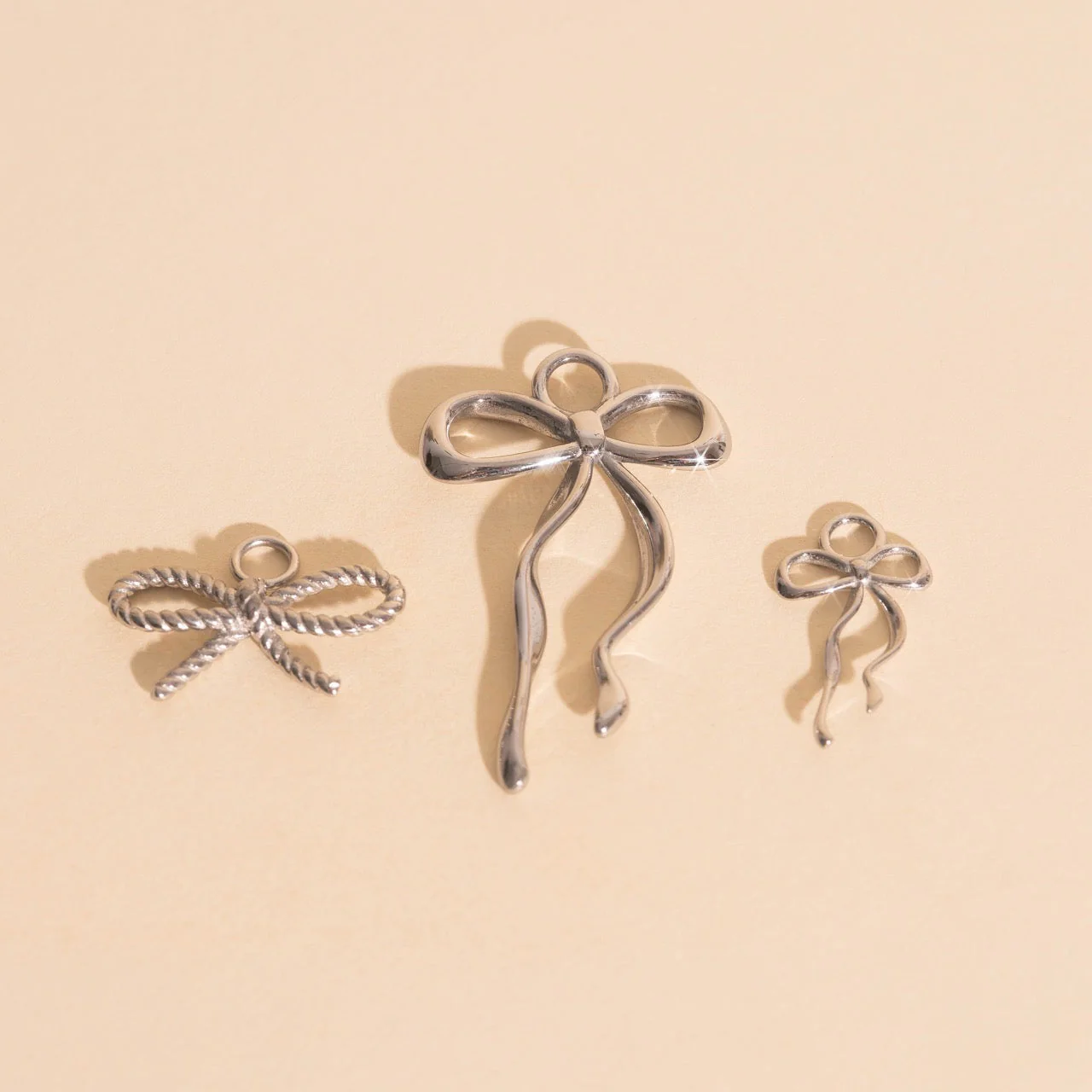 Dainty Bow Huggie Hoop Charms - Image 9