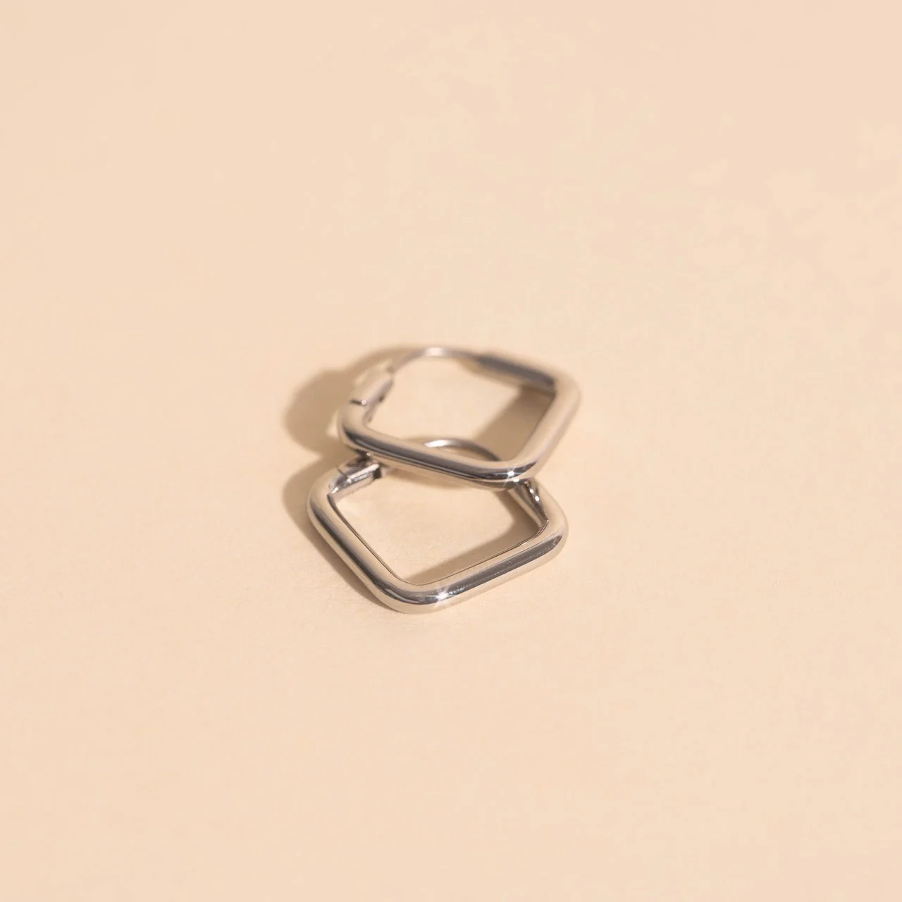 Diamond Rounded Huggie Hoop Earrings - Image 9