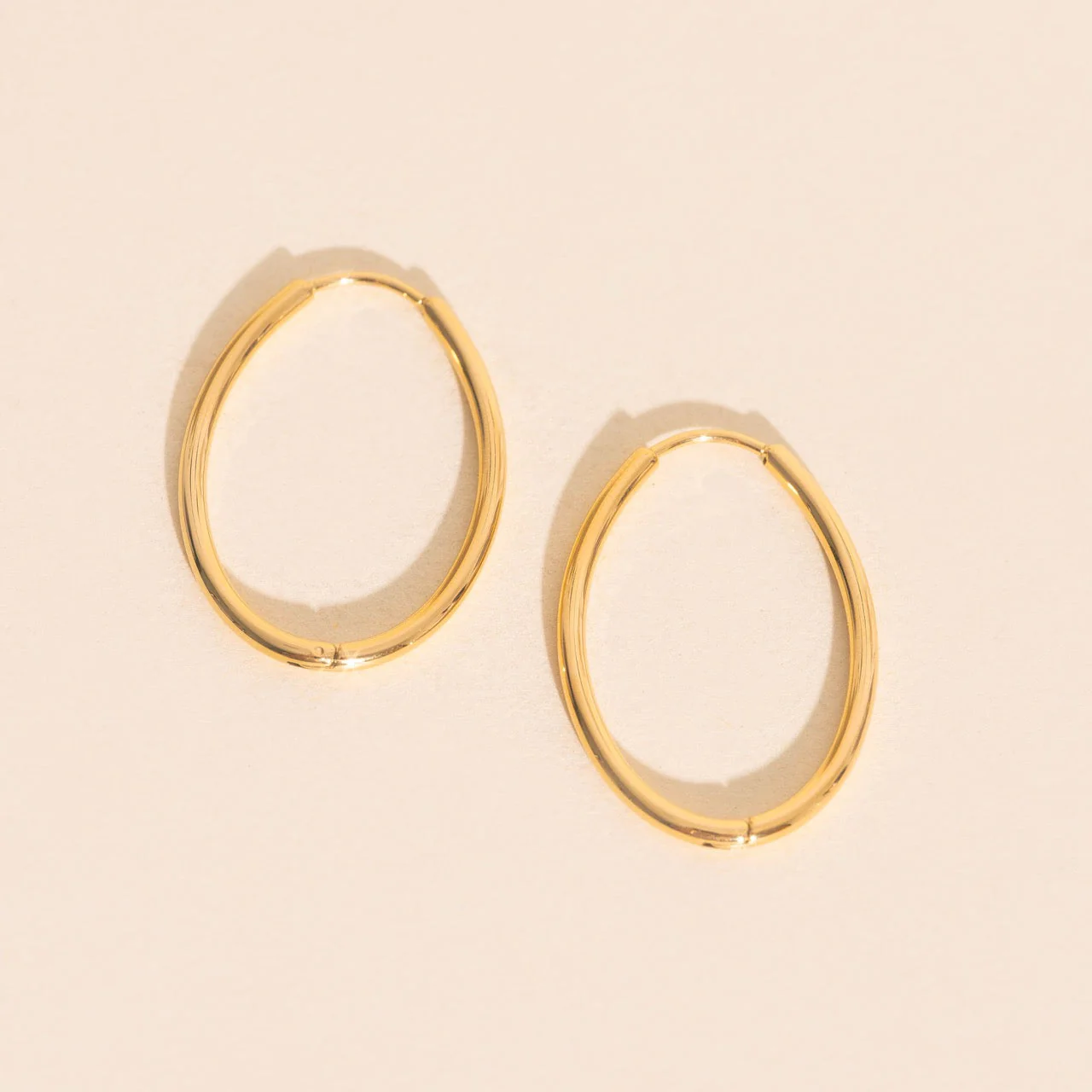 Oval Rounded Huggie Hoop Earrings - Image 3