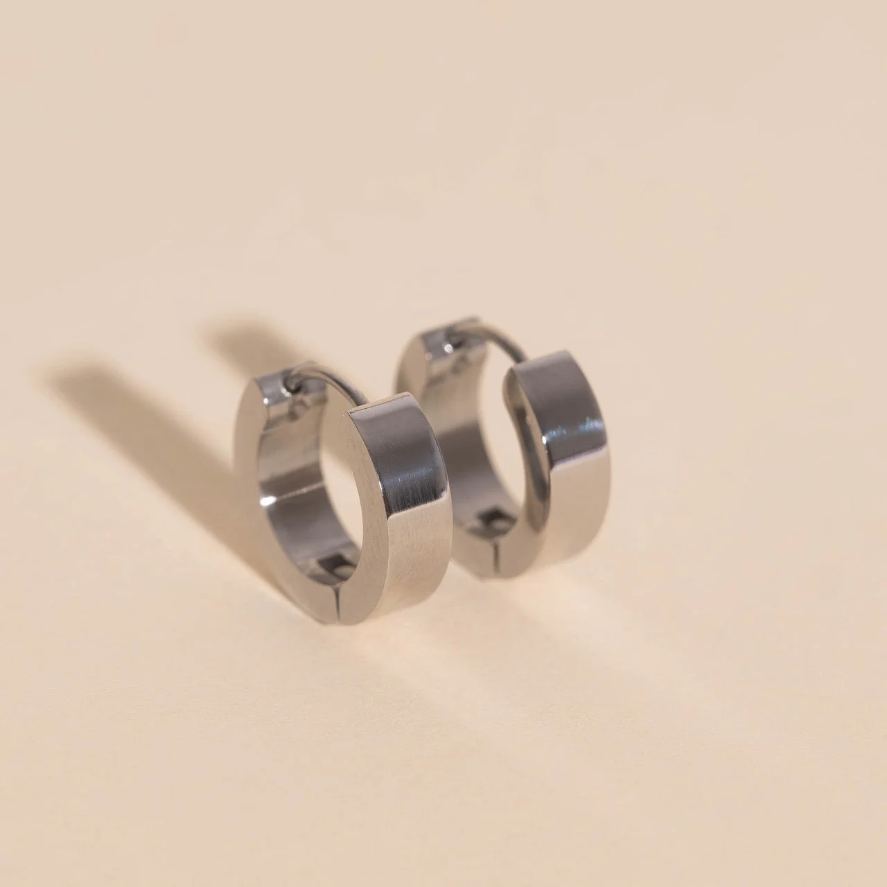 Smooth Chunky Huggie Hoop Earrings - Image 2