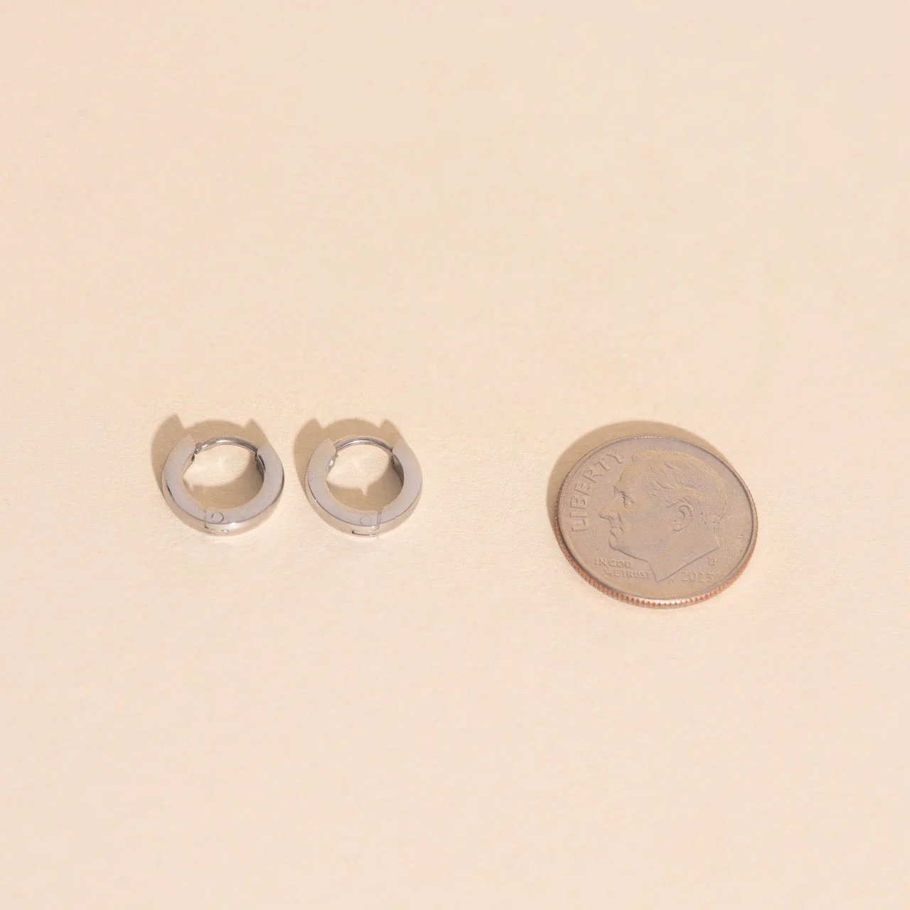Smooth Tiny Huggie Hoop Earrings - Image 12